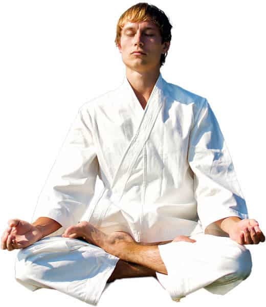 Martial Arts Lessons for Adults in Old Bethpage NY - Young Man Thinking and Meditating in White