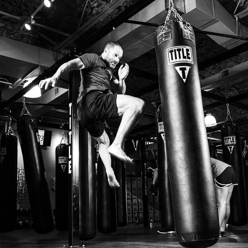Mixed Martial Arts Lessons for Adults in Old Bethpage NY - Flying Knee Black and White MMA